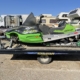 Snowmobile and trailer